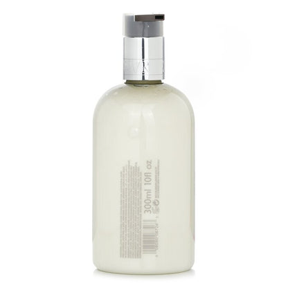 Molton Brown Delicious Rhubarb & Rose Hand Lotion 300ml/10oz