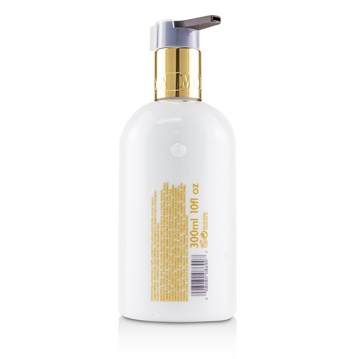 Molton Brown Mesmerising Oudh Accord & Gold Body Lotion 300ml/10oz